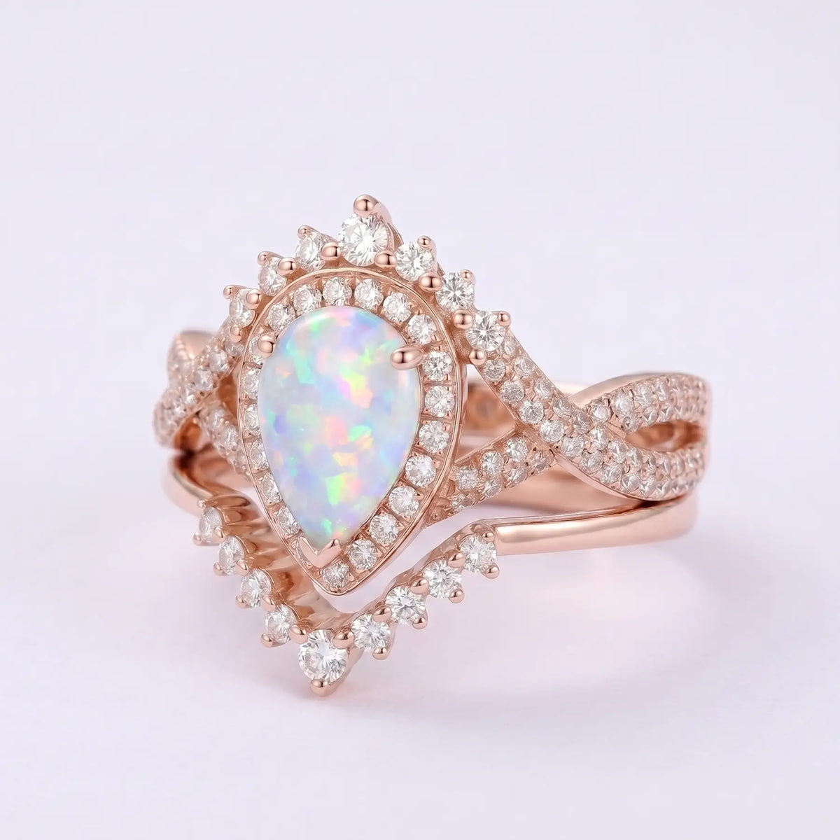 Celestia Loop – 2pc Infinity Halo Opal Engagement Ring Set Pear Cut