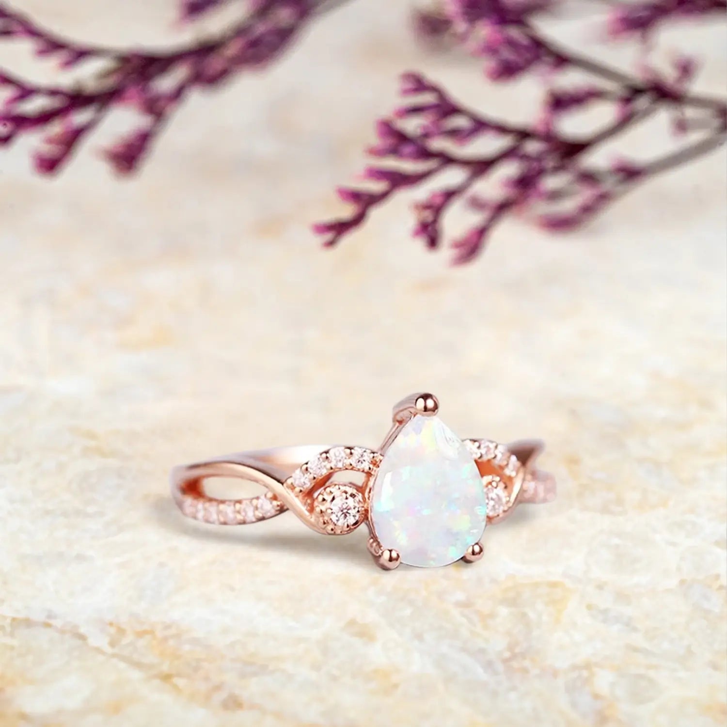 orleone Pear Cut Opal Engagement Ring | Twisted Rose Gold October Birthstone Promise Ring