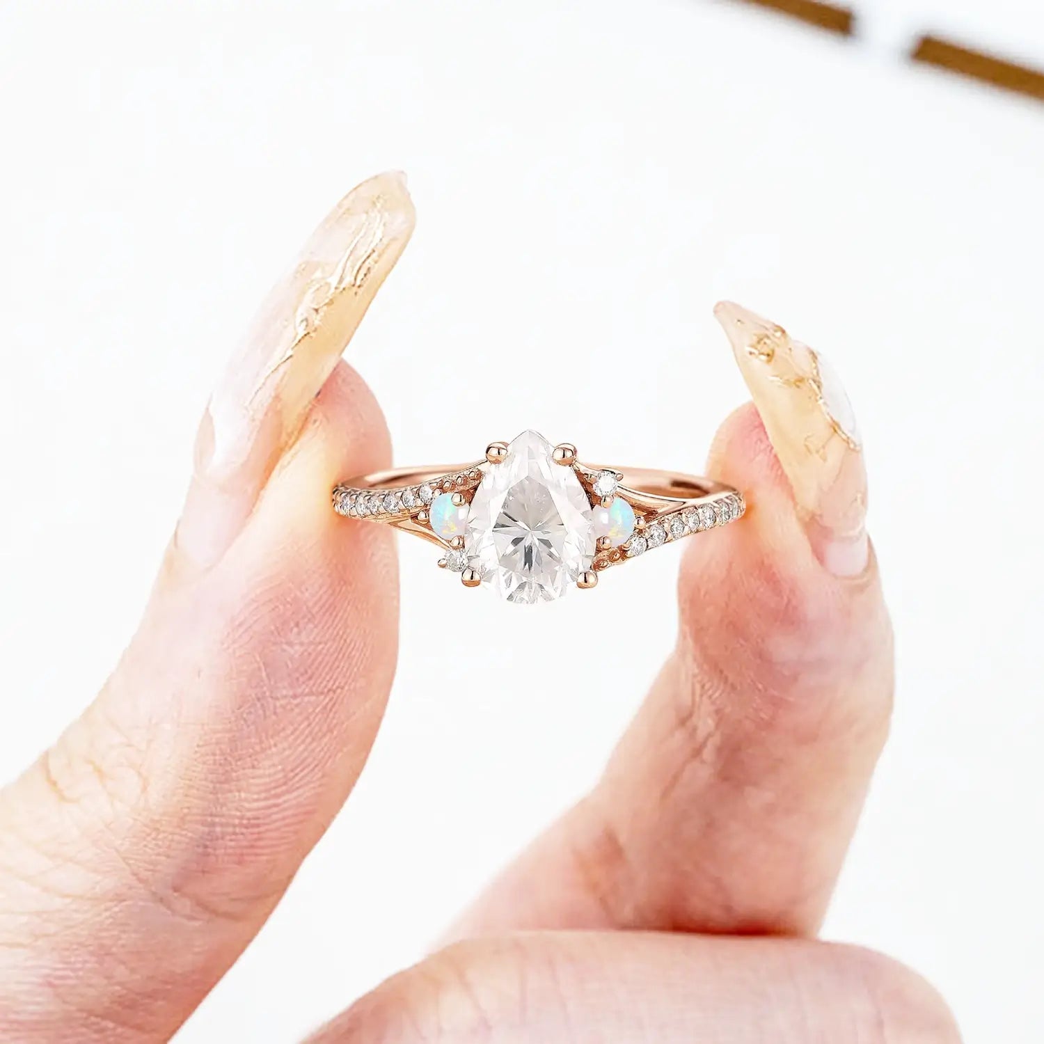 Pear cut moissanite engagement ring with opal accents in rose gold Art Deco design for women gift