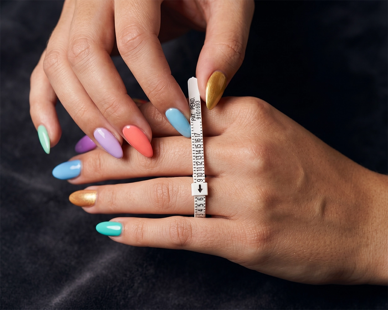 Person using a ring size tool