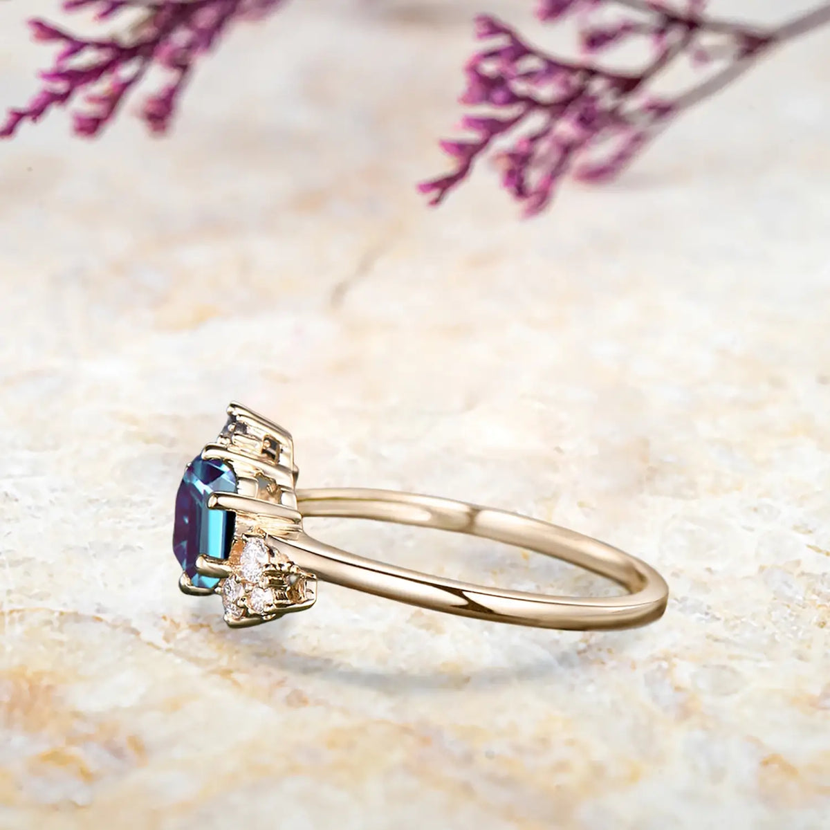 Side view of alexandrite cluster ring showing yellow gold band and hexagon stone detail
