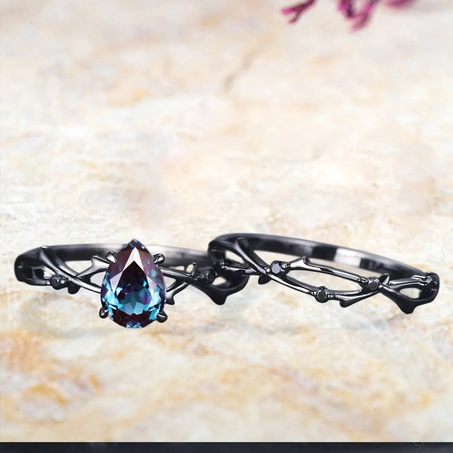 Pear alexandrite engagement ring and curved wedding band separated black gold bridal set