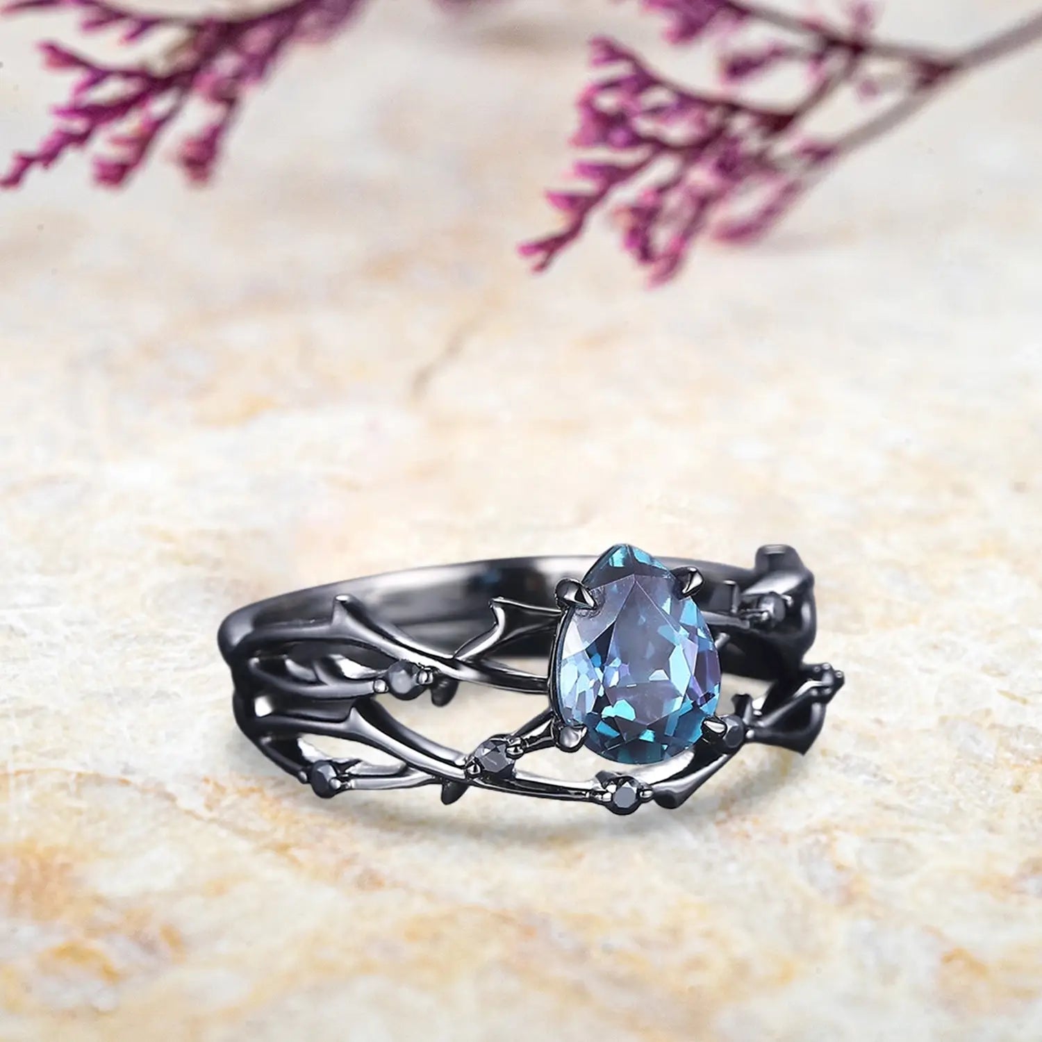 Side view of alexandrite twig bridal set showing black gold branch and onyx stone details