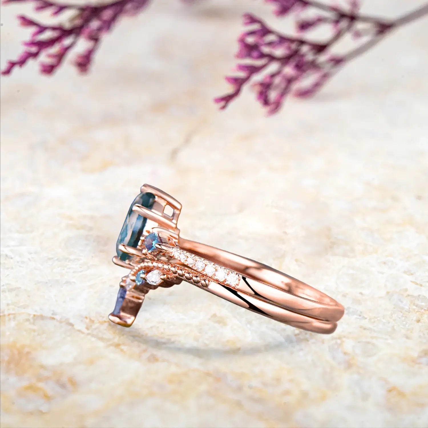 Side view of alexandrite bridal set showing rose gold milgrain details and kite stones