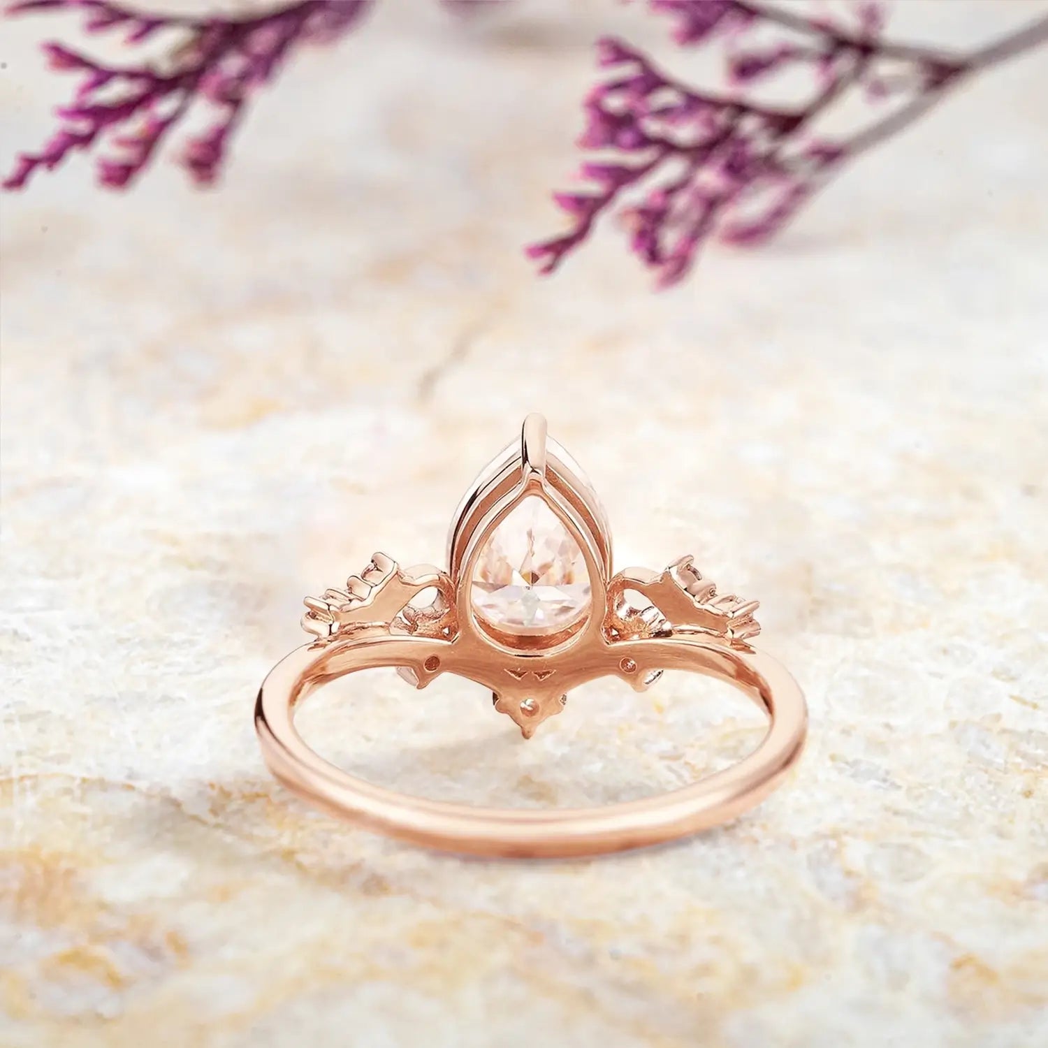 Back view of vintage moissanite engagement ring showing art deco curved band craftsmanship