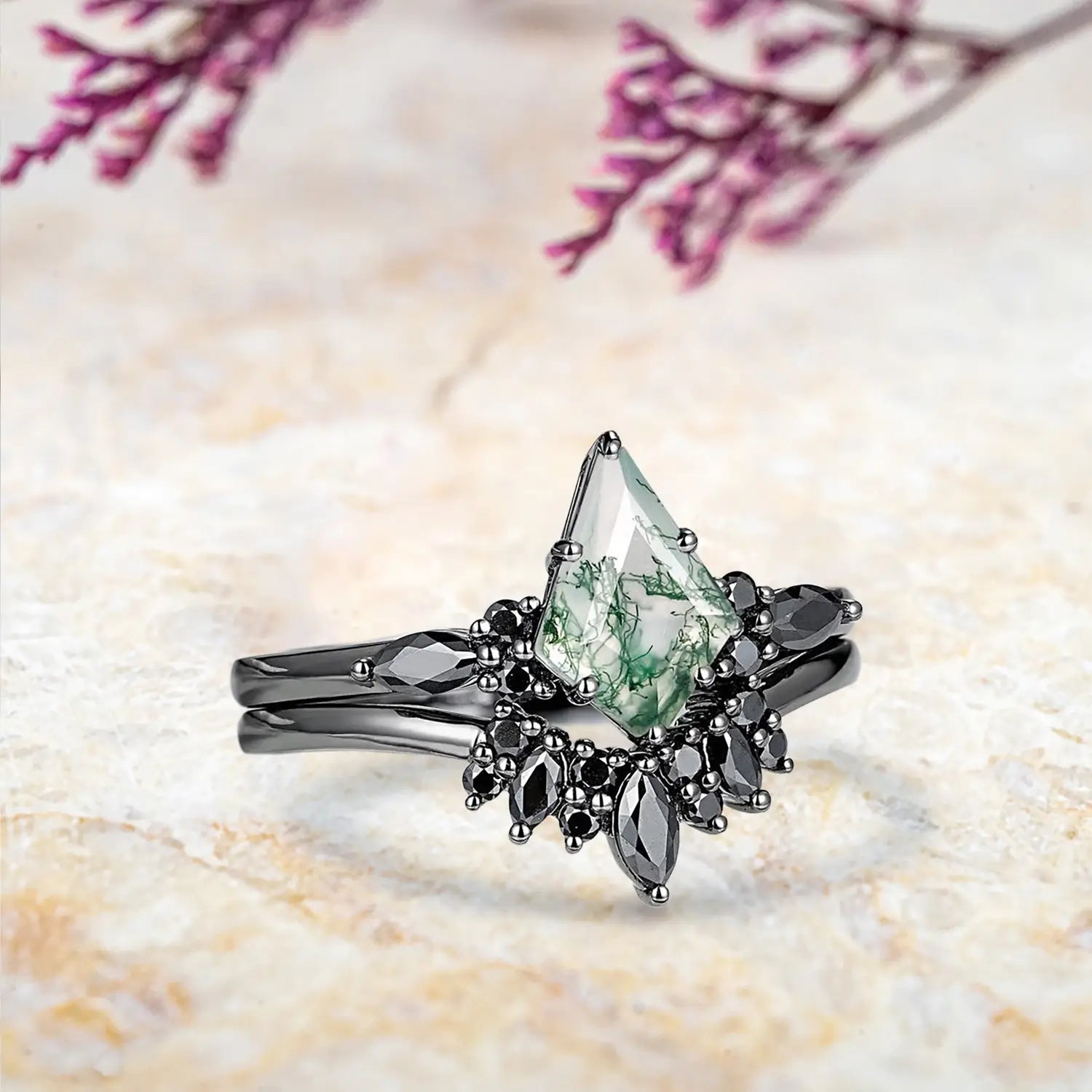 Side view of kite moss agate ring showing luxury black moissanite cluster and curved chevron wedding band profile