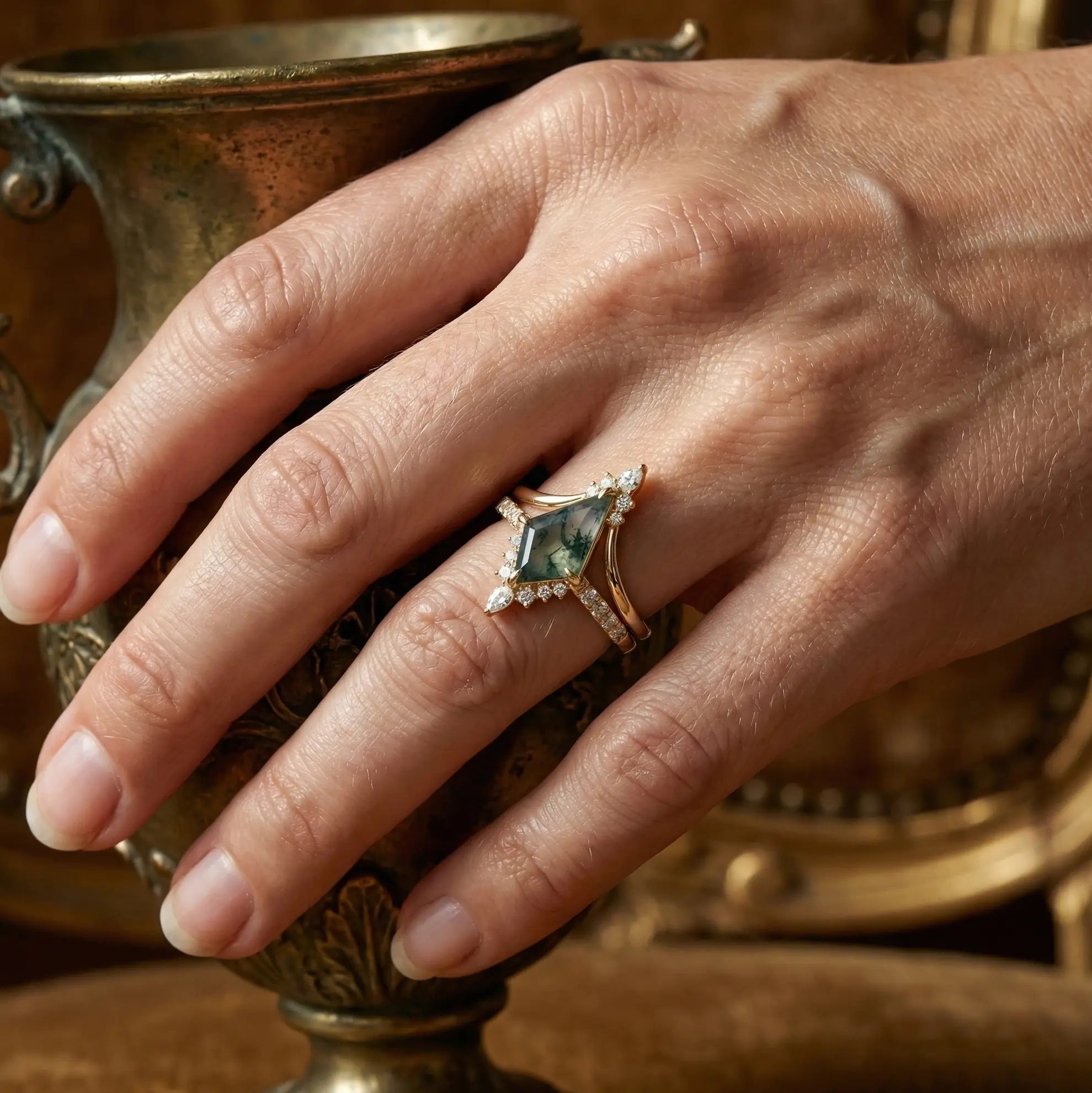 The Sylvara Grace™ bridal ring set featuring a kite cut natural moss agate with refined moissanite accents in a minimalist gold setting.