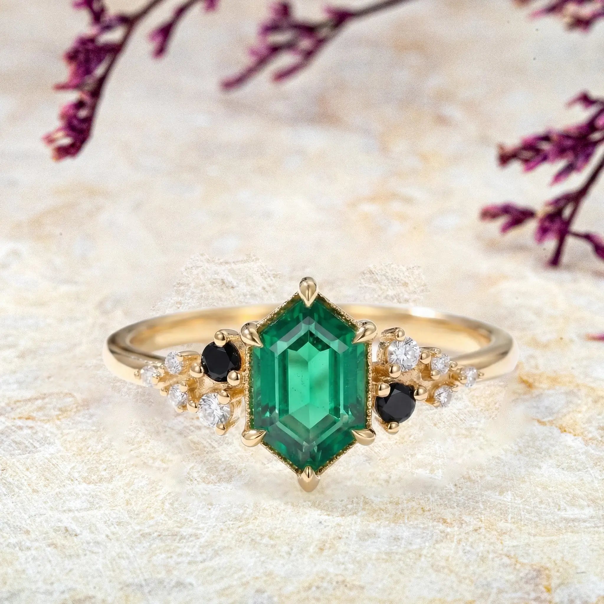 Long hexagon emerald engagement ring with moissanite and black onyx cluster