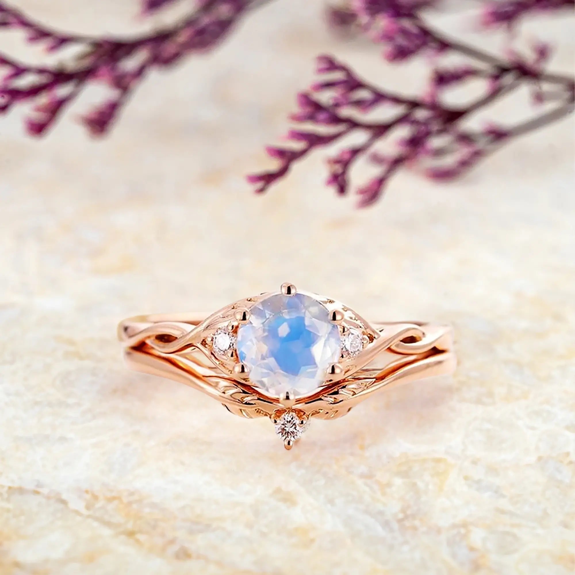 round-moonstone-engagement-ring-set-rose-gold-twisted-infinity-leaf-band-orleone