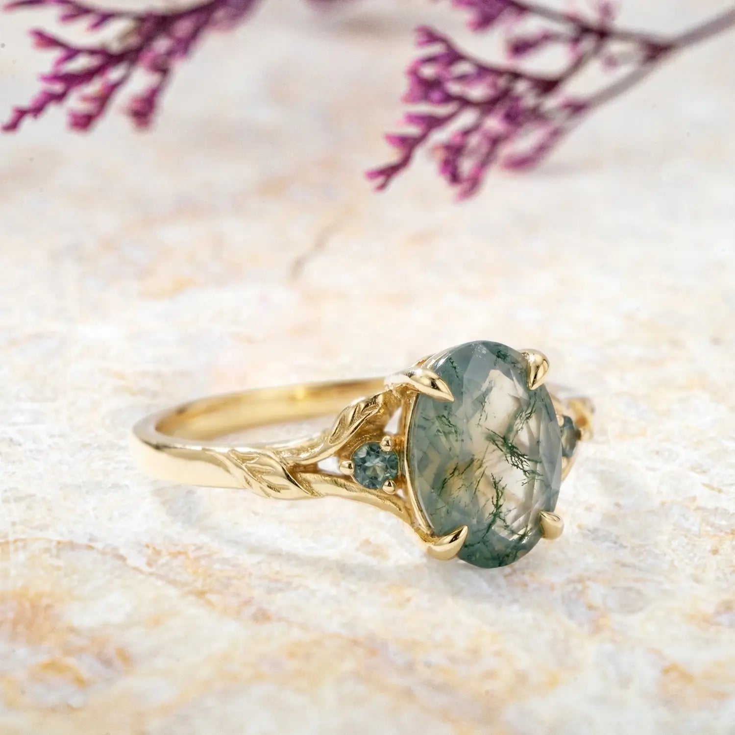 Nature inspired oval moss agate ring with leaf design yellow gold
