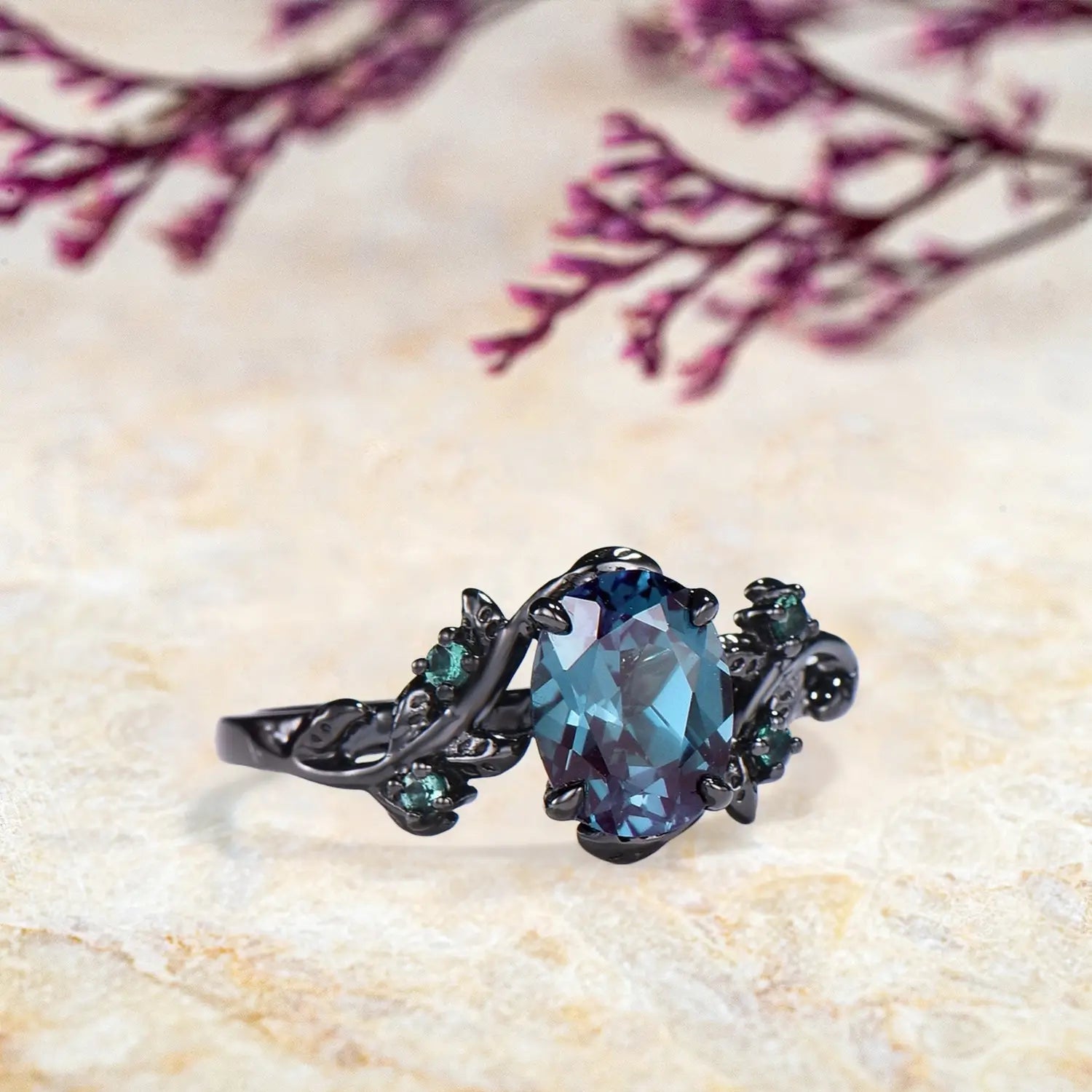Side view of oval alexandrite ring showing nature inspired organic twig branch band with alexandrite accents