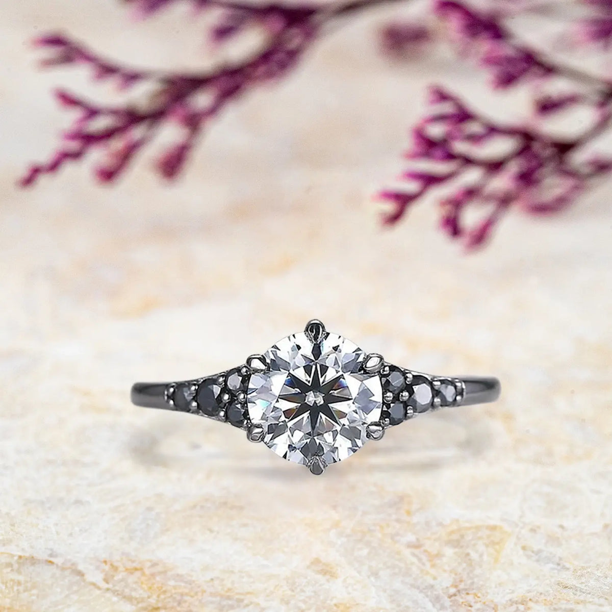 Black gold engagement ring with round moissanite and onyx cluster accents