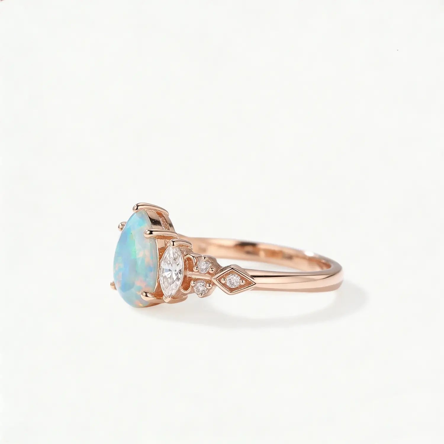 pear opal ring for women with marquise side stones custom ring