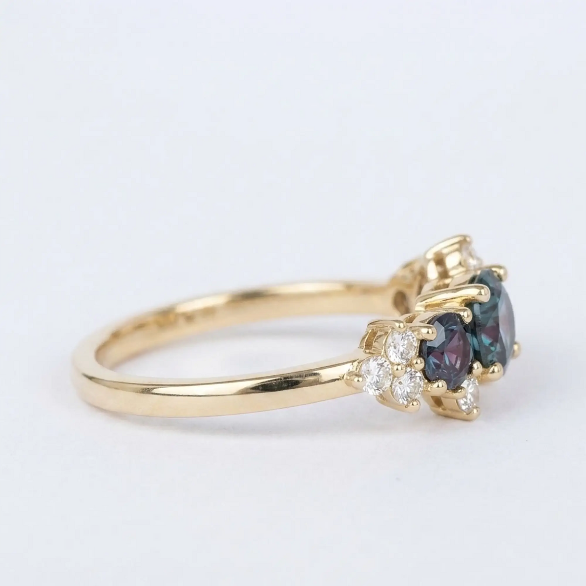 Angled side view of Aeloria geometric engagement ring showing secure prong alignment and band durability