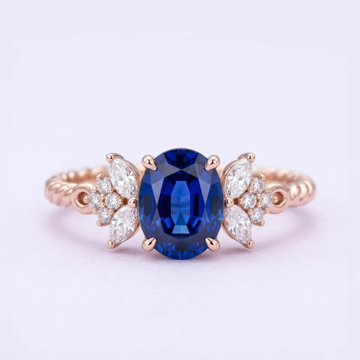Handcrafted oval blue sapphire twisted cluster engagement ring - Aethelgard by Orleone