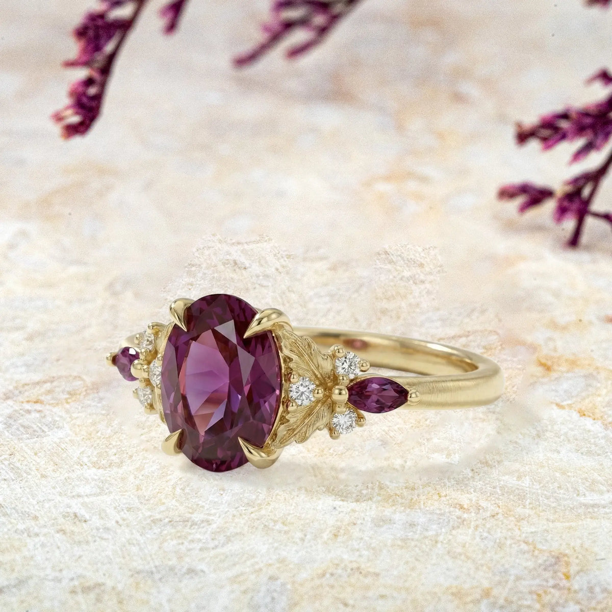 Side view of oval alexandrite ring showing leaf cluster and band profile