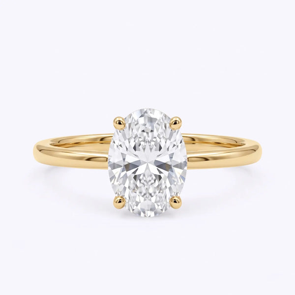 Classic oval lab diamond solitaire engagement ring in yellow gold