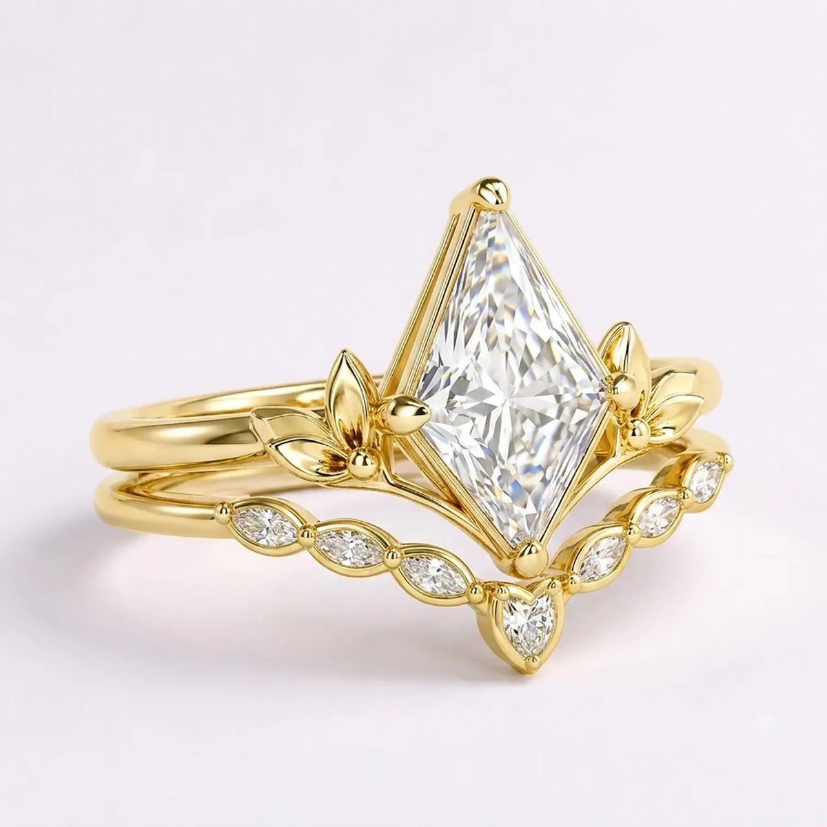 Side view of nature-inspired moissanite ring set showing layered gold band design