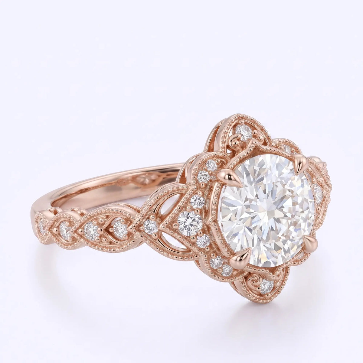 Edwardian filigree engagement ring with ornate openwork and scroll detailing