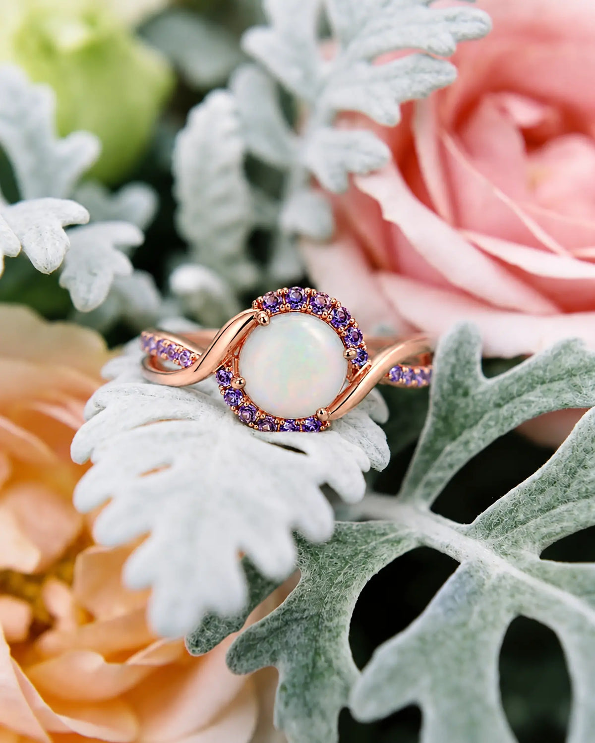 Elegant opal and amethyst engagement ring styled in a refined jewelry scene