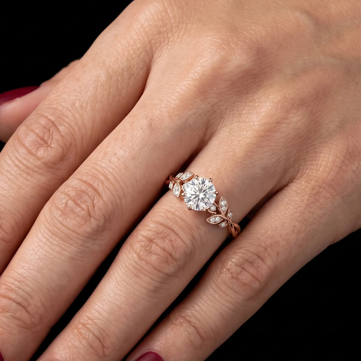 Round moissanite floral ring worn on hand
