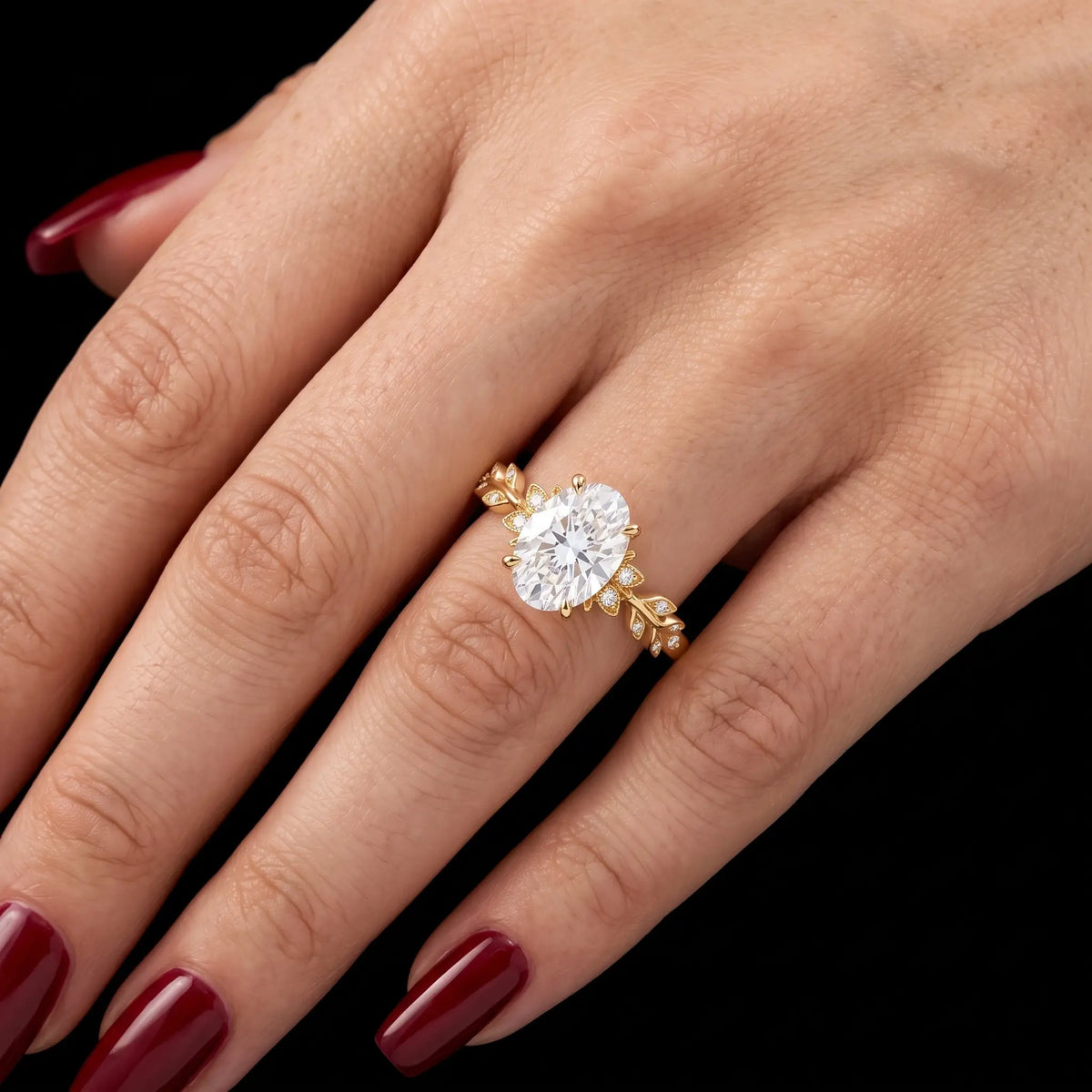 Oval moissanite leaf engagement ring worn on hand 7*9mm gem