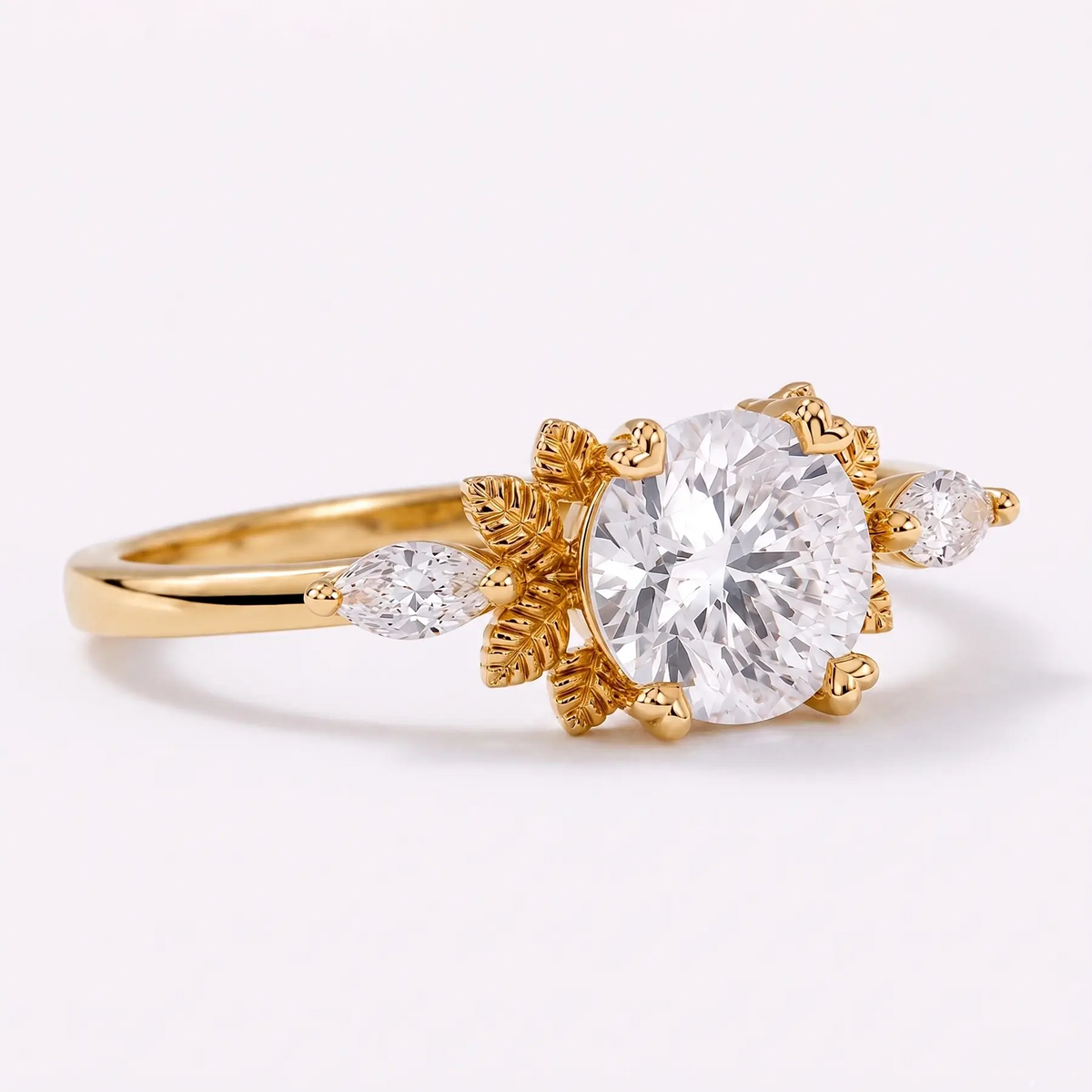 Side view of three stone moissanite leaf ring showing elegant gold setting and slim band