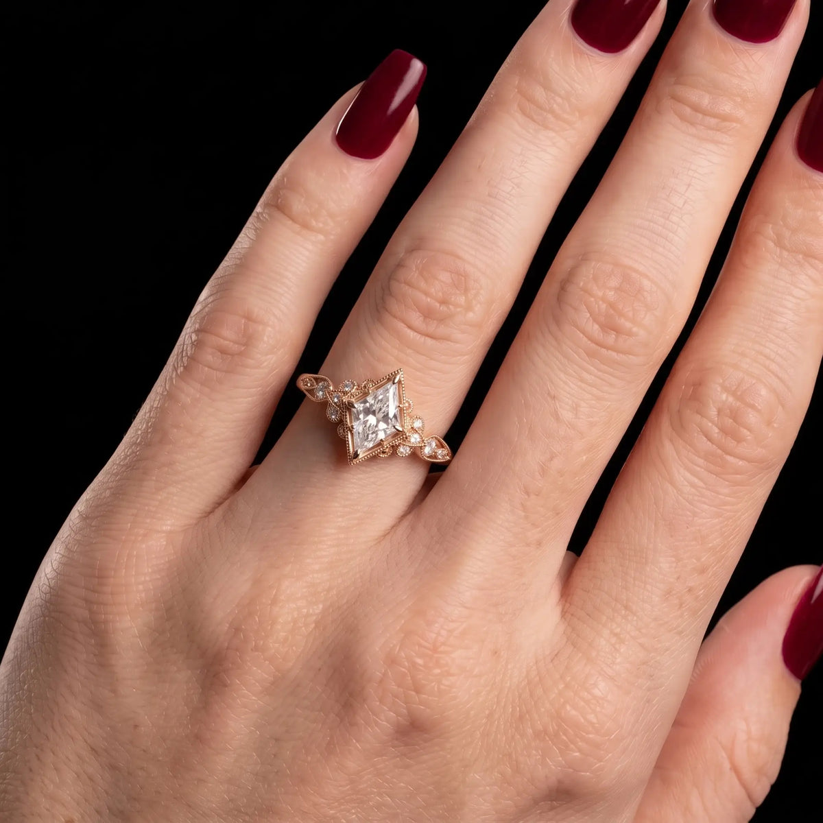 Vintage kite cut moissanite ring worn on hand