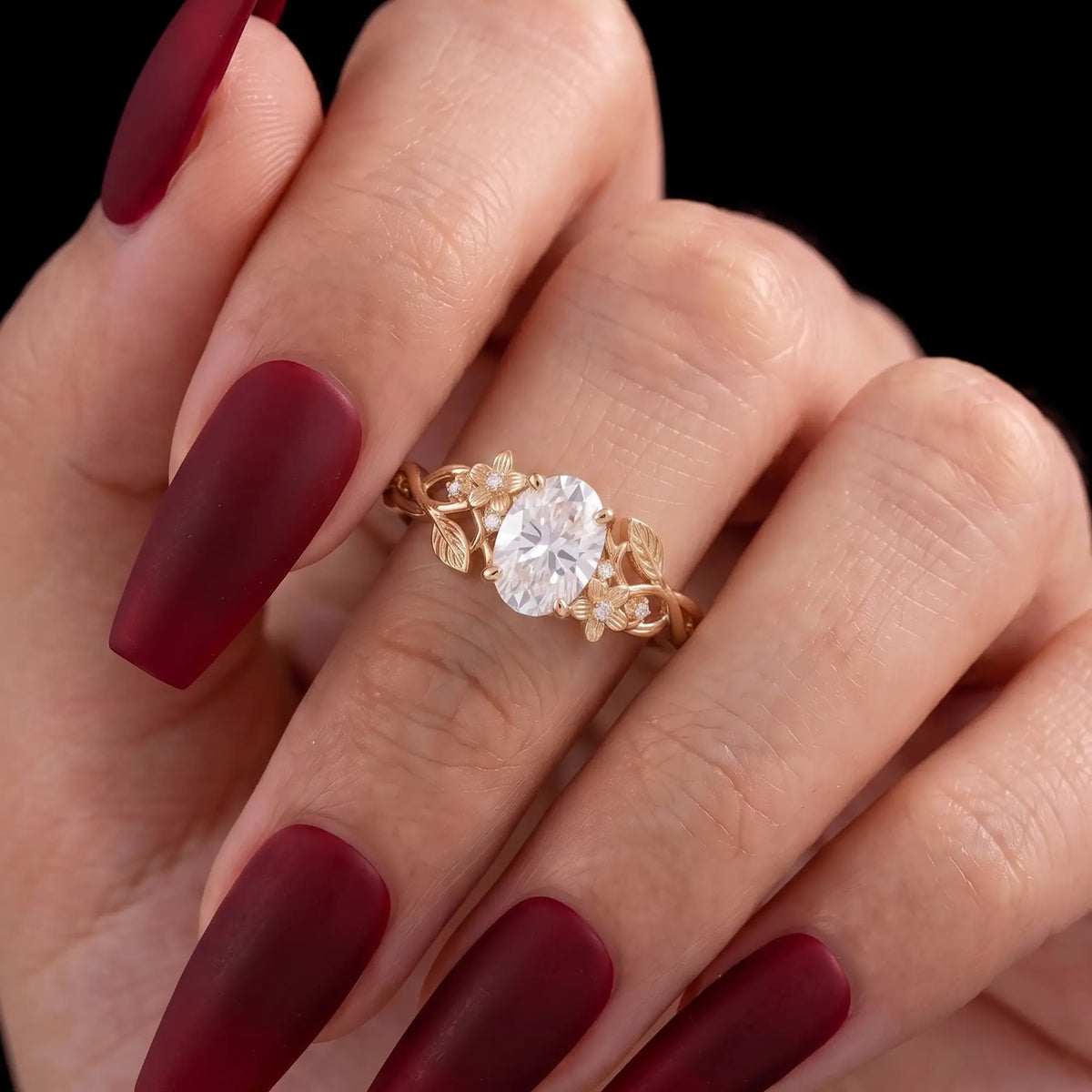 Nature inspired gold engagement ring with botanical openwork design