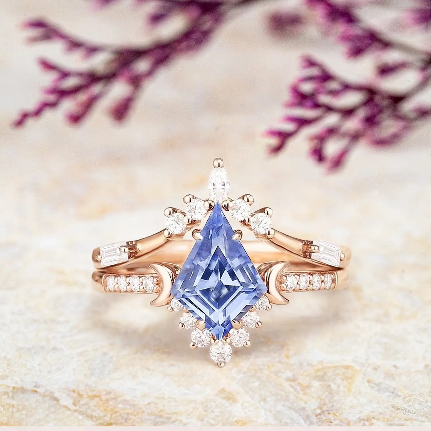 Kite cut cornflower blue sapphire engagement ring with diamond tiara cluster and moon baguette wedding band set