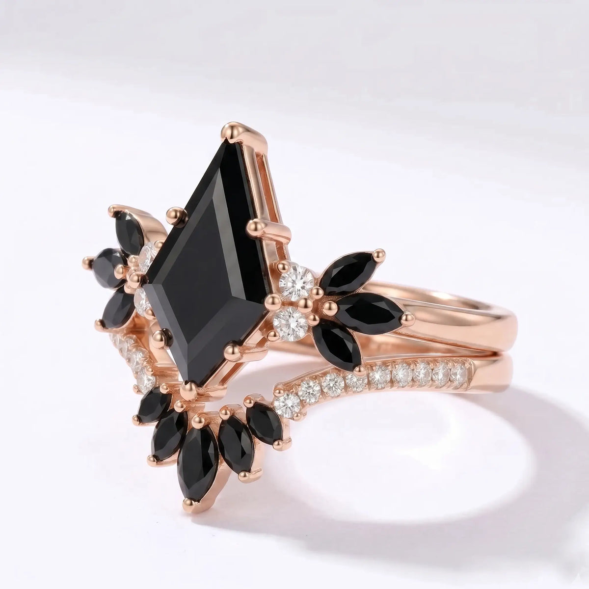 Close-up of black moissanite center stone with clear and marquise accent stones