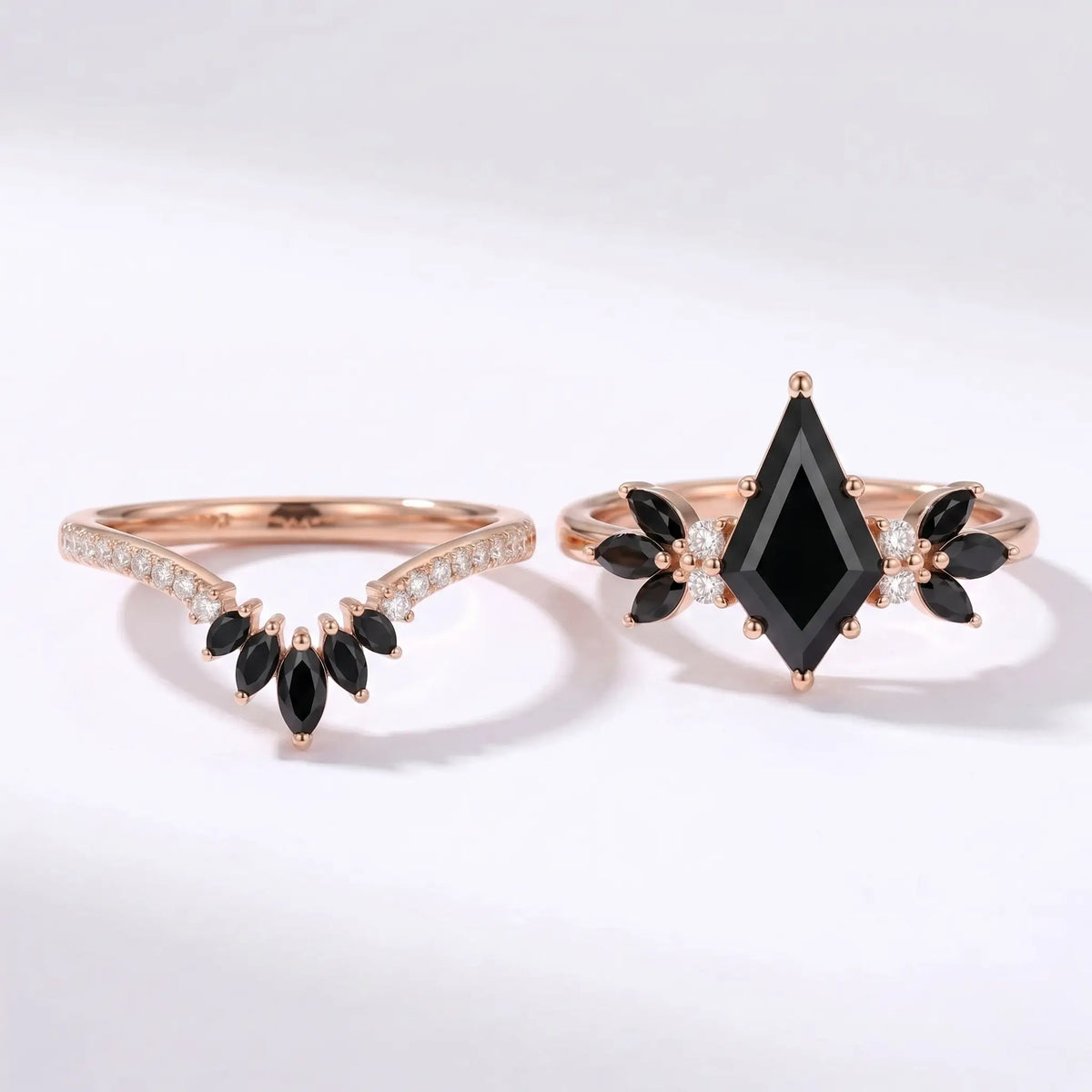 Black moissanite engagement ring and matching band displayed separately