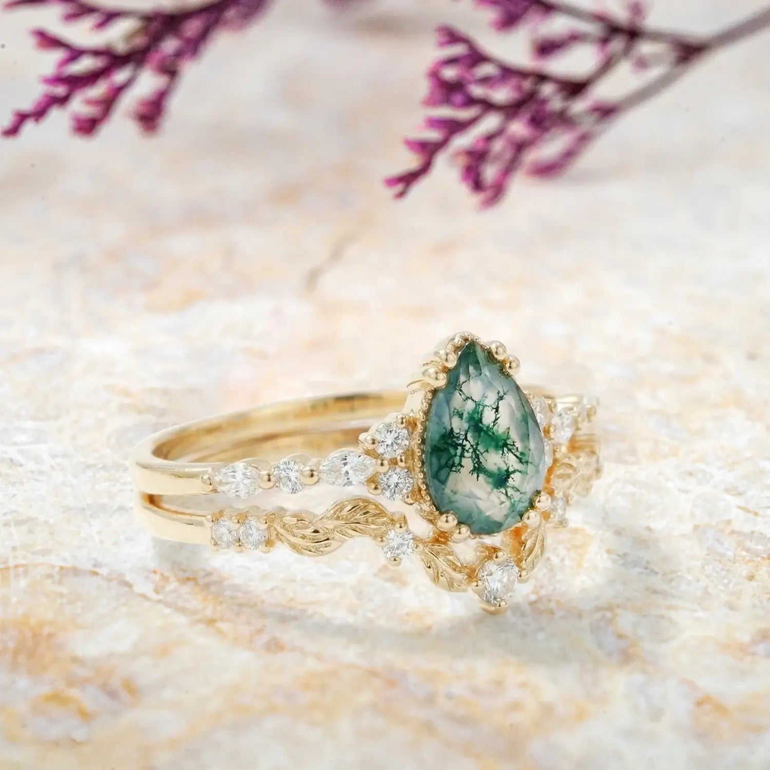 Handmade pear moss agate ring set in 14k gold with moissanite accents