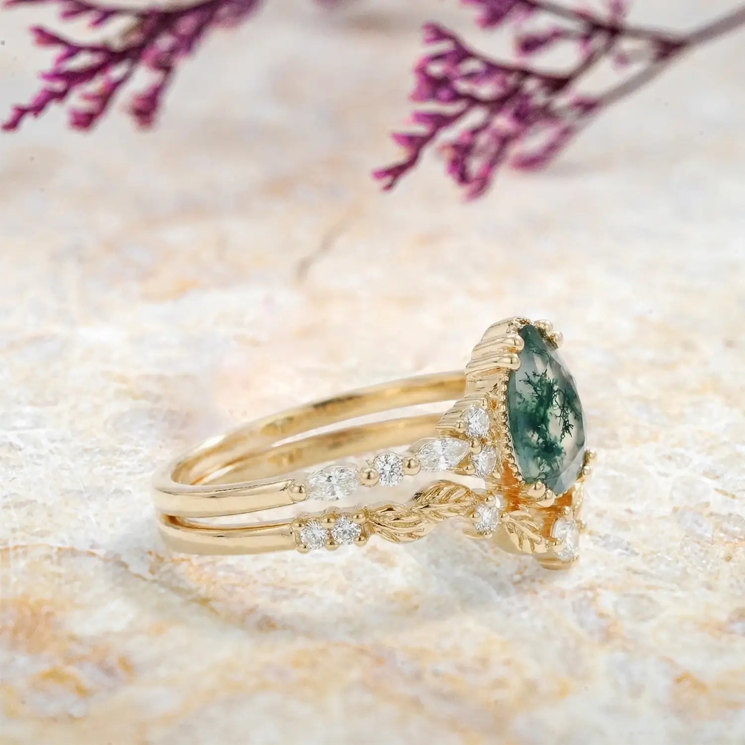 Pear cut moss agate leaf engagement ring with marquise and round moissanite accents