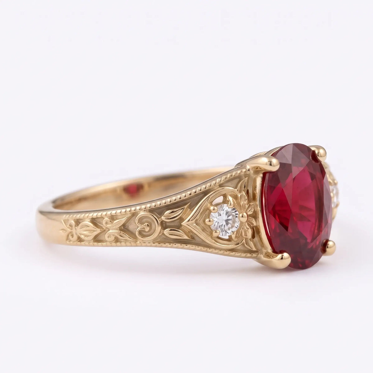 Floral engraved ruby engagement ring with antique inspired gold details