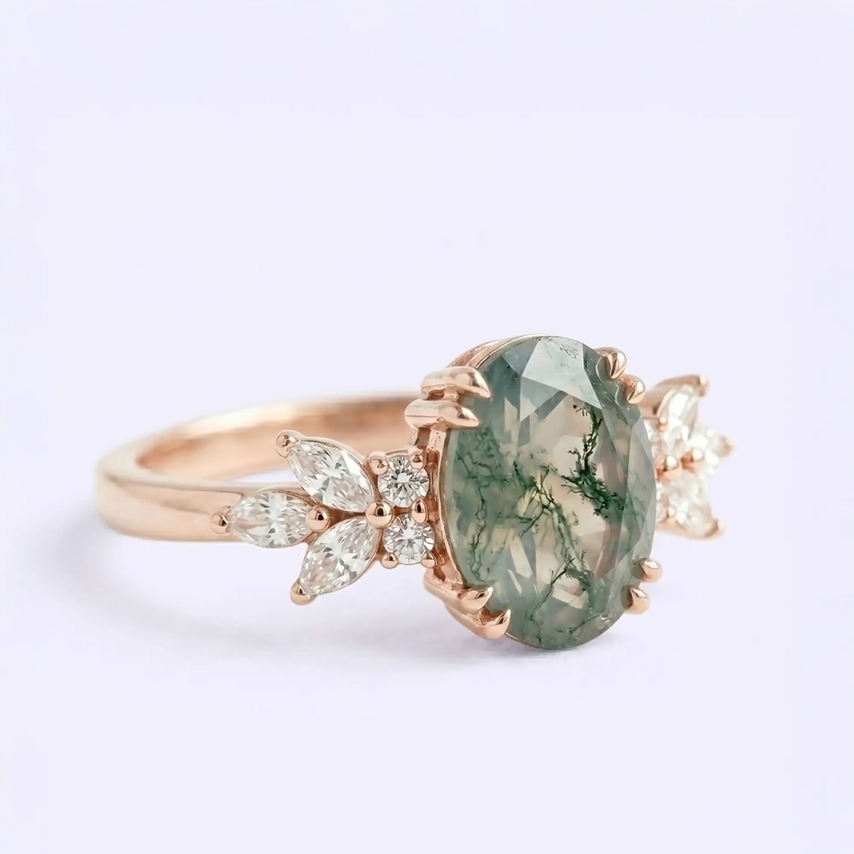 Artisanal gold cluster ring featuring natural moss agate and marquise leaf moissanite cluster