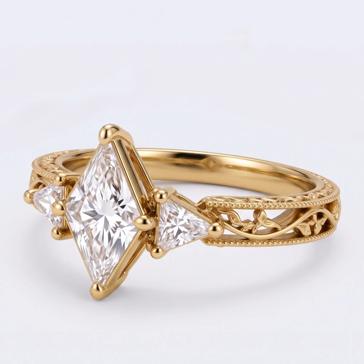 Three quarter view of nature inspired three stone moissanite ring with sculpted gold leaf band