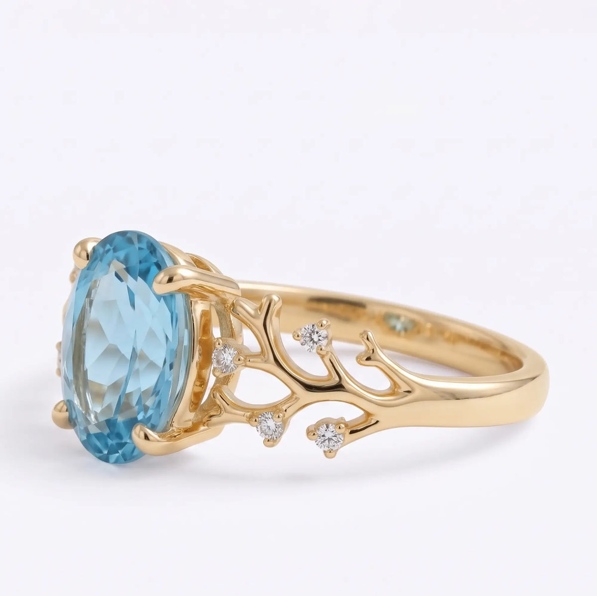 Ocean inspired engagement ring with oval London Blue Topaz and moissanite