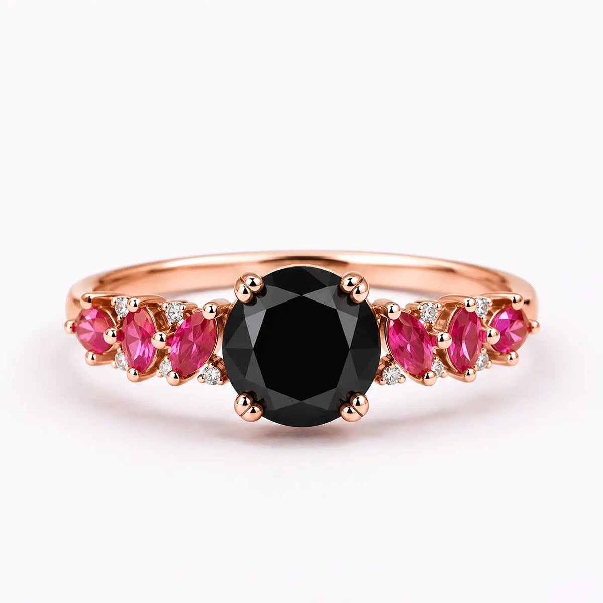 Round black moissanite engagement ring with marquise ruby cluster accents in rose gold