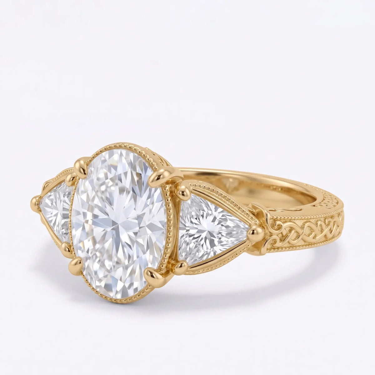 Three quarter view of a vintage-inspired oval moissanite ring with ornate gold detailing