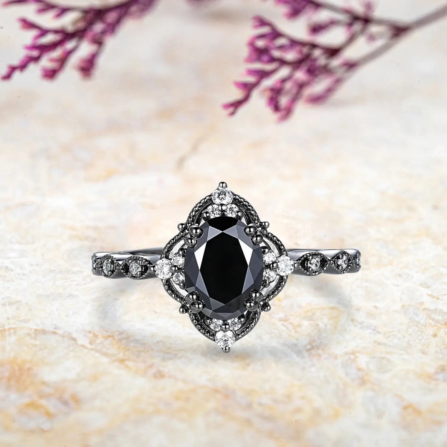 Oval black onyx engagement ring with vintage crown cluster and chevron diamond wedding band in black gold main ring
