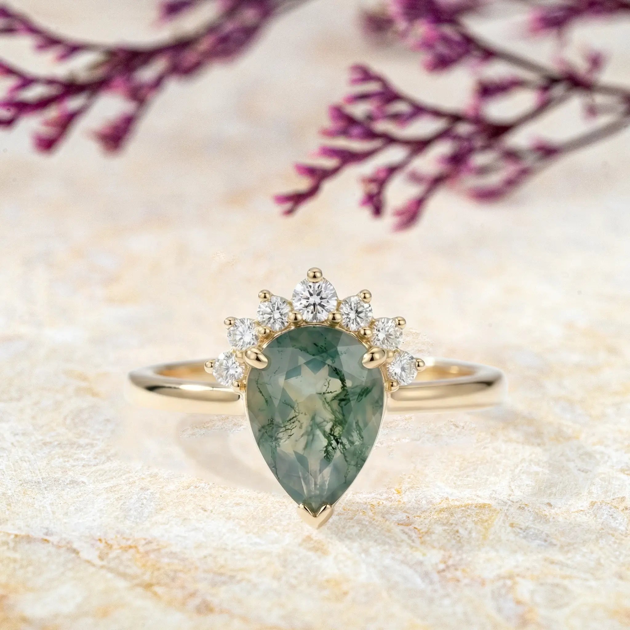 Pear moss agate engagement ring in yellow gold with half-halo crown minimalist design