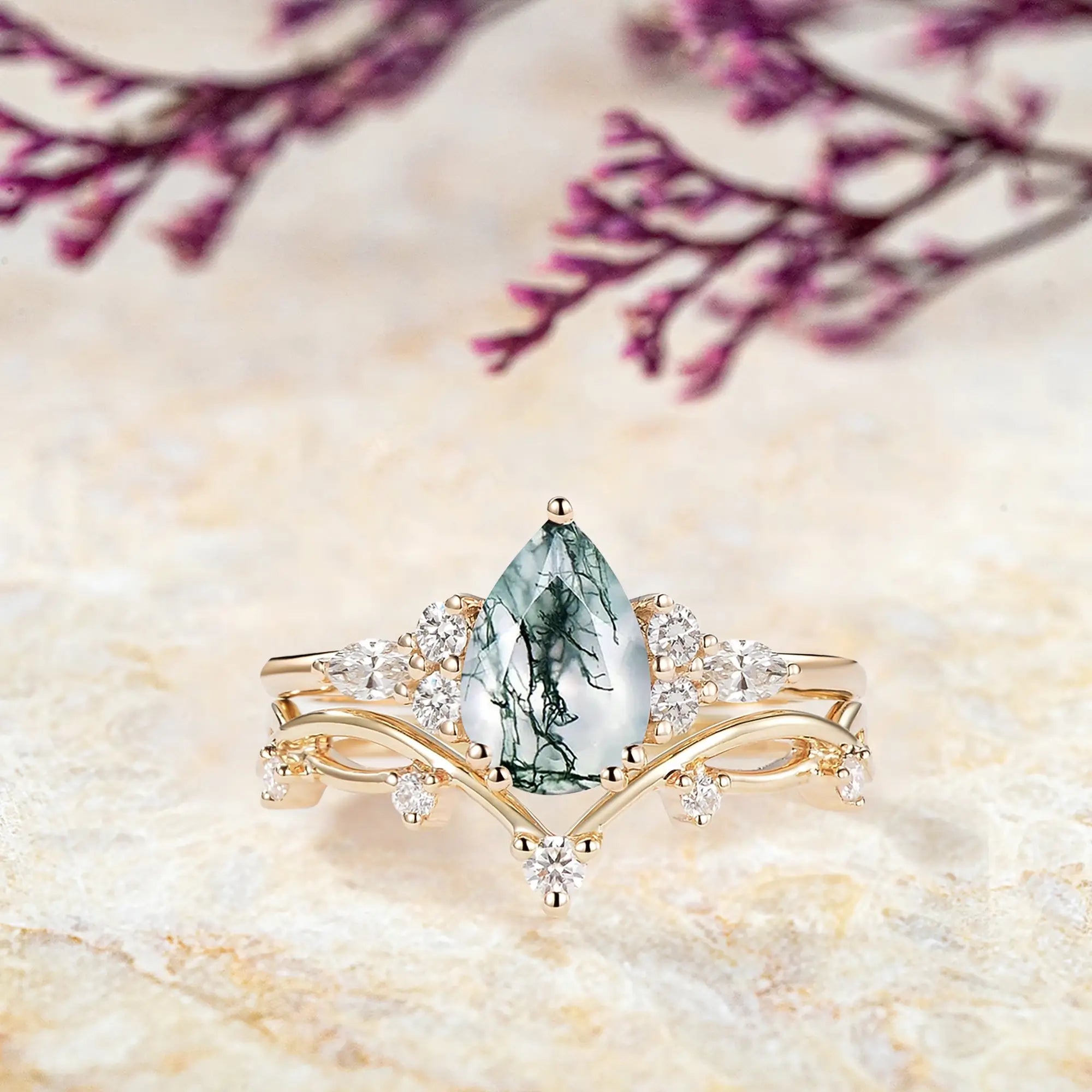 Verdant Branch pear moss agate engagement ring set in rose gold with chevron moissanite