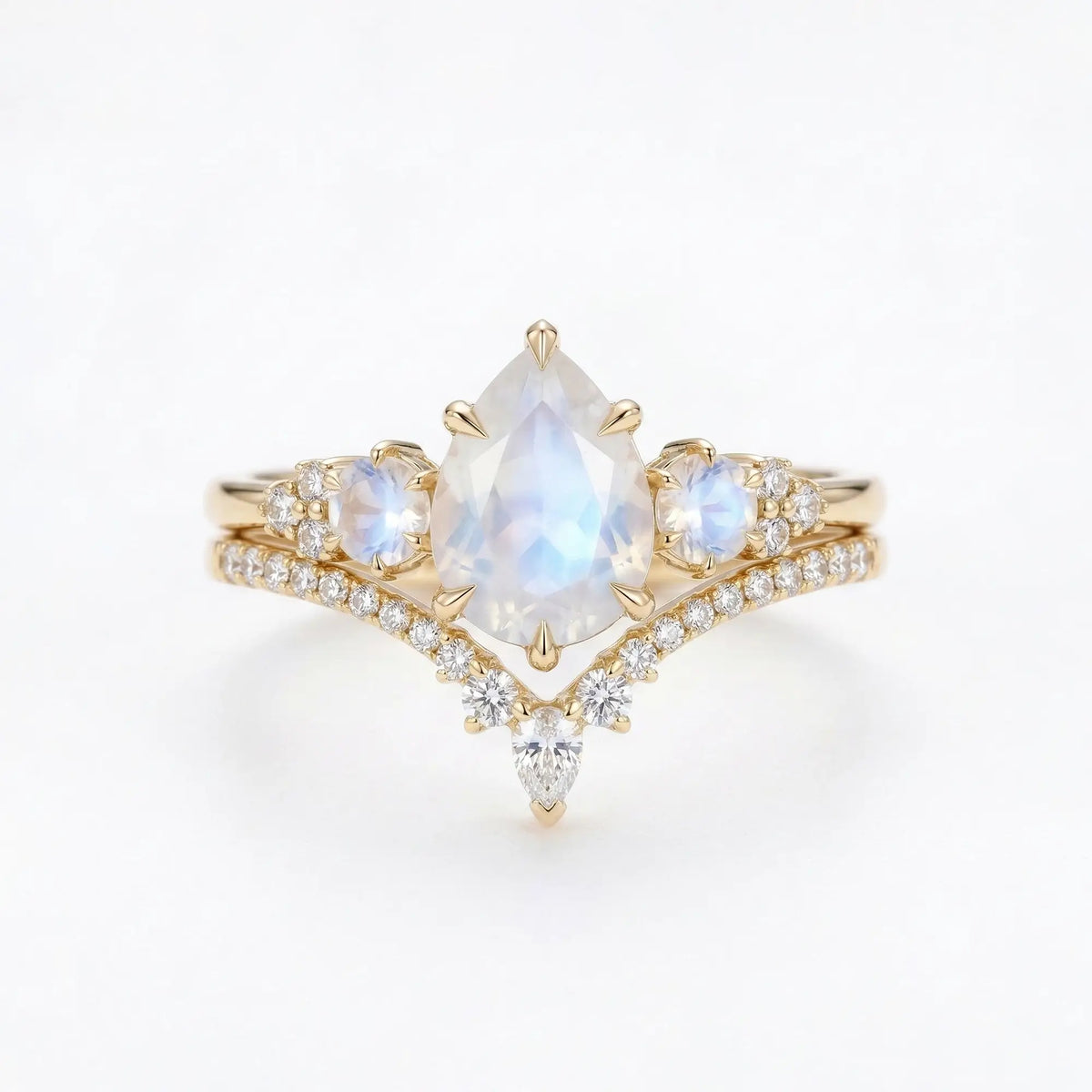 pear shaped moonstone three stone engagement ring set with moissanite curved wedding band june birthstone moonstone bridal set gold