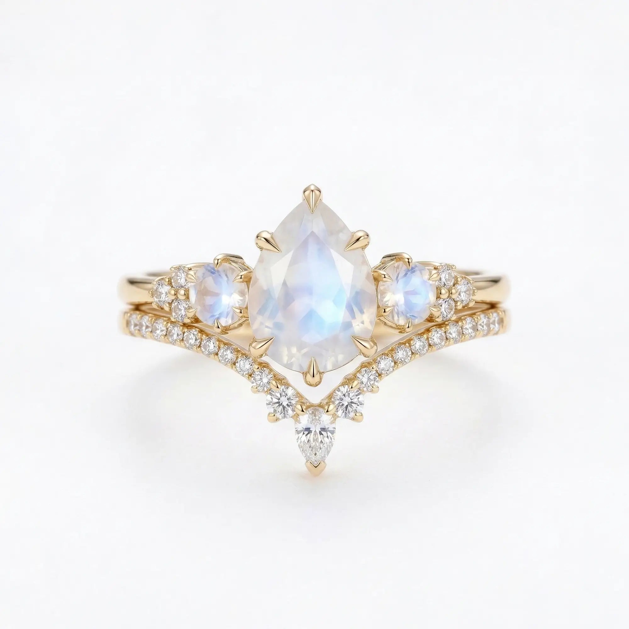 pear shaped moonstone three stone engagement ring set with moissanite curved wedding band june birthstone moonstone bridal set gold