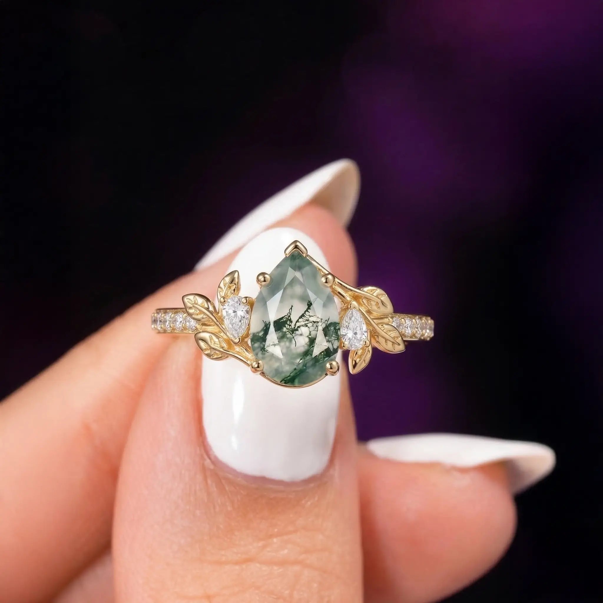 pear cut moss agate engagement ring with gold leaf setting and moissanite accents botanical nature ring