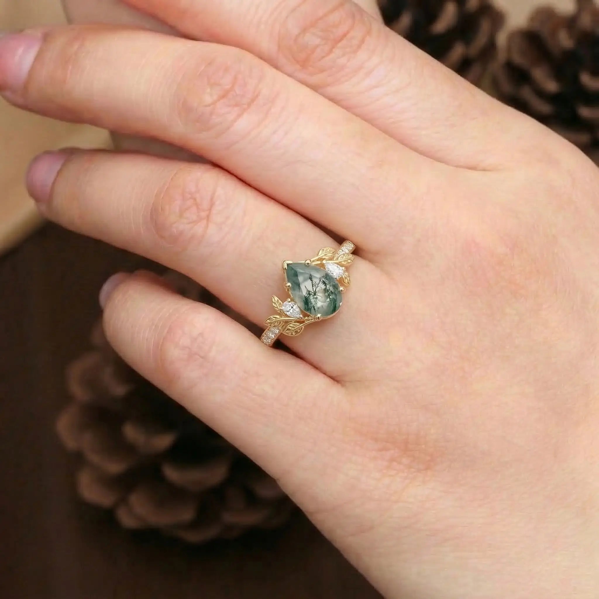 pear cut moss agate engagement ring with gold leaf setting and moissanite accents botanical nature ring for women orleone
