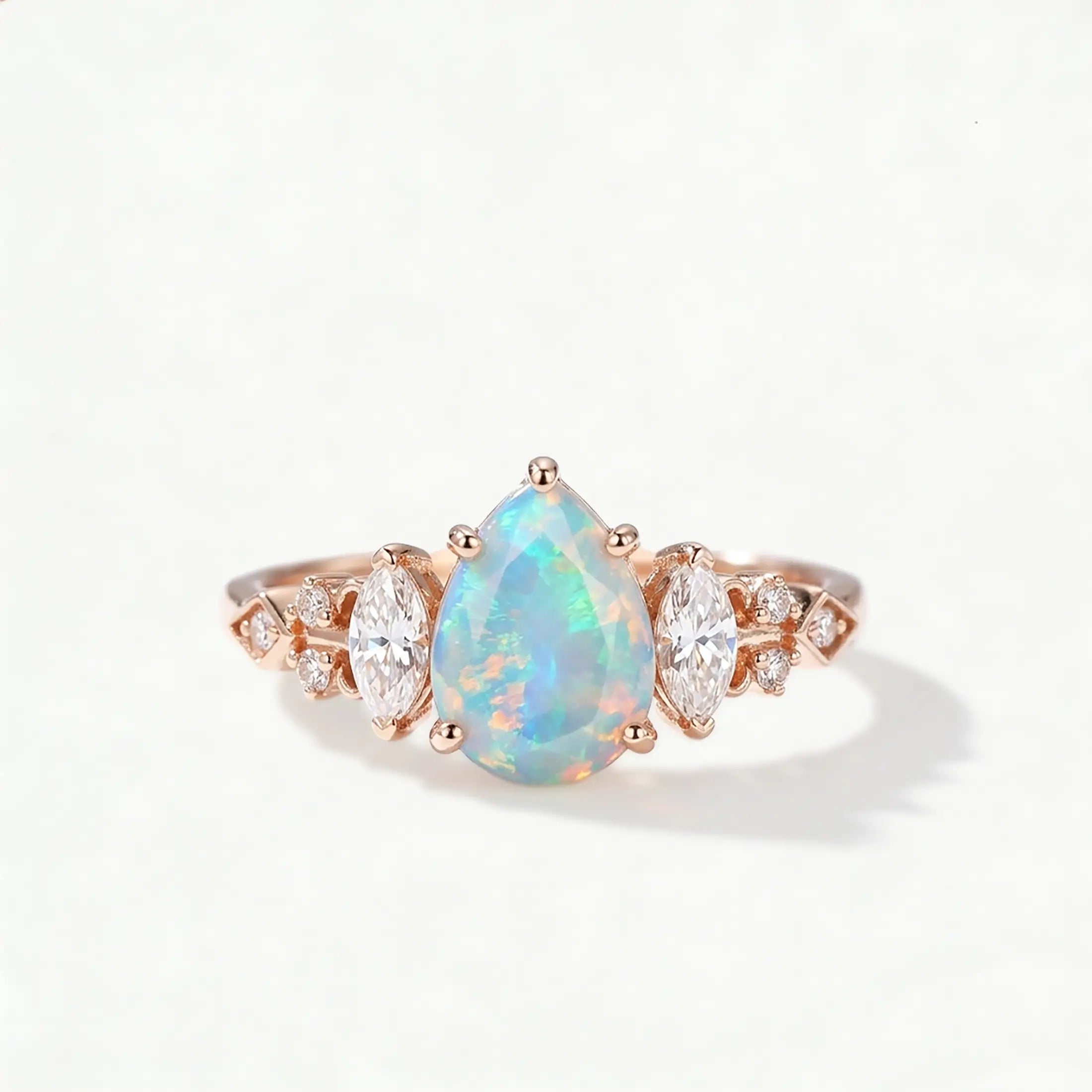 pear cut opal engagement ring marquise moissanite vintage design