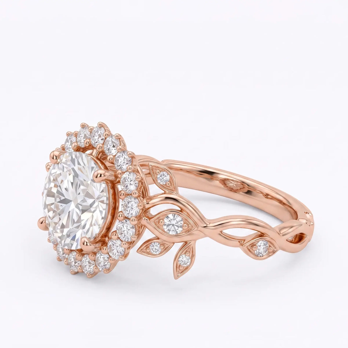 Side angle of a botanical halo leaf engagement ring with round moissanite center stone left view