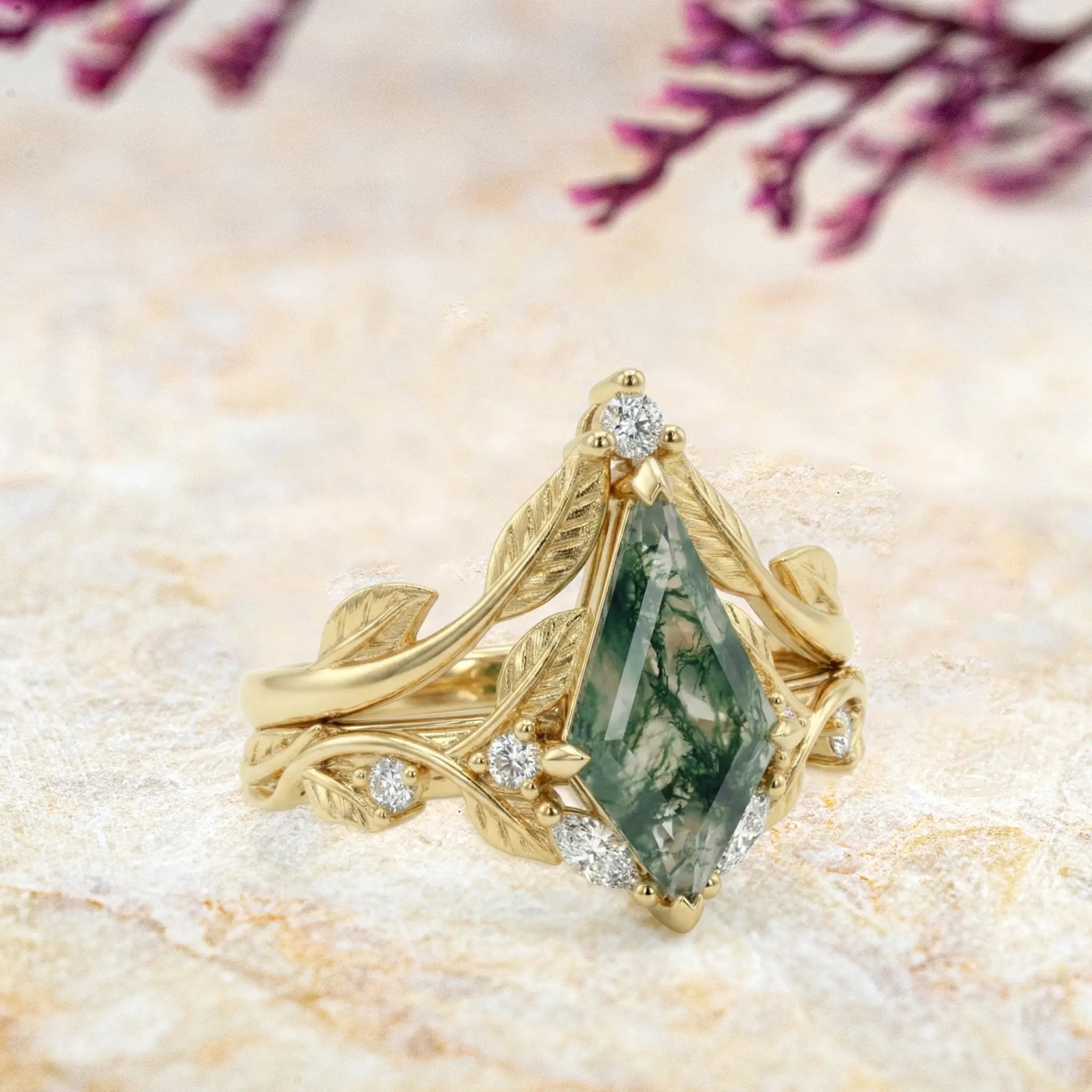 Handcrafted Verdantia Promise™ leaf ring set featuring a kite cut natural moss agate and moissanite accents in sculpted gold.